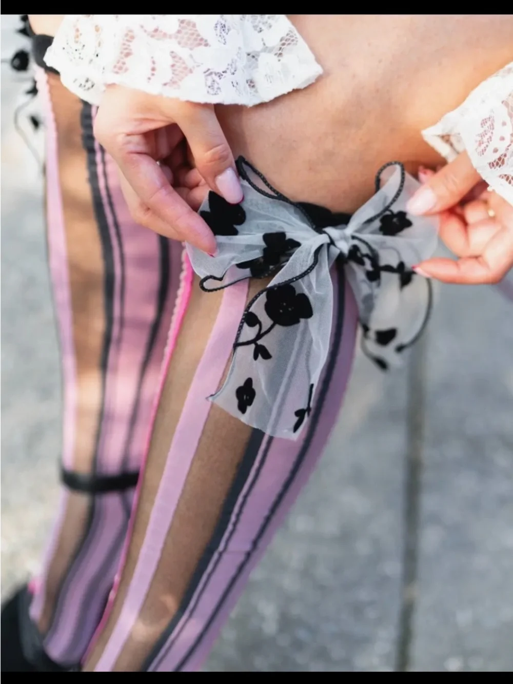 Sock Candy Parision Pink Striped Knee-High Socks with Floral Bow Accent.